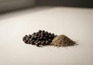 Black peppercorns and ground black pepper
