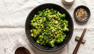 Edamame and broccoli stir-fry scattered with sesame seeds