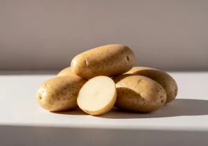 Raw potatoes, one halved